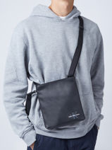 Sac Bandoulire Calvin klein jeans Noir tagged flatpack K509287-vue-porte