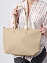 Sac Port paule A4 Lacoste Beige l.12.12 concept seasonal NF3984SJ-vue-porte